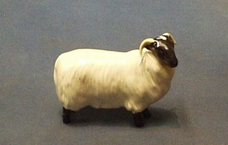 A Beswick figure of  a standing ram 3"