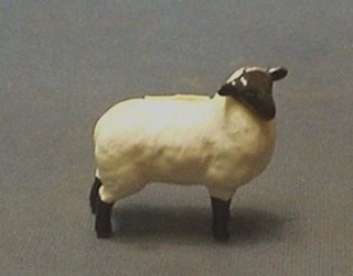 A Beswick figure of a Scottish black faced sheep 2 1/2"