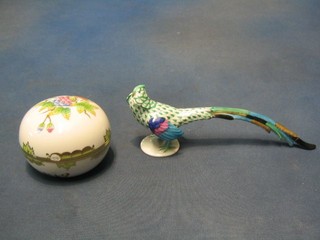 A Herend-Hvngary circular porcelain trinket box and cover decorated butterflies 4" (chipped) and a figure of a pheasant (f and r)