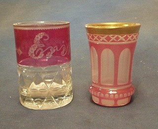 A Bohemian cut glass goblet engraved with an E, 4 1/2" and a Bohemian opaque and gilt banded glass 4 1/2"