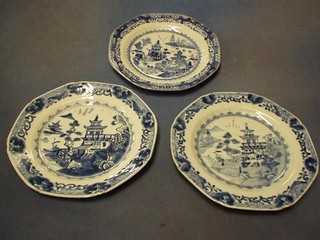 A pair of 18th/19th Century Oriental octagonal blue and white porcelain plates decorated Pagodas and 1 other 9 1/2"