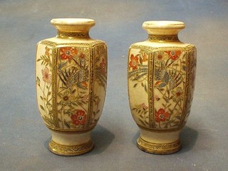 A pair of late Japanese Satsuma octagonal pottery vases with crackle glazed ground 16"