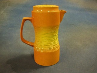 An orange Carltonware coffee pot, the base marked Carltonware and impressed 2854 8"