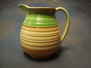 A Shelley pottery jug with blue and green banding 9"