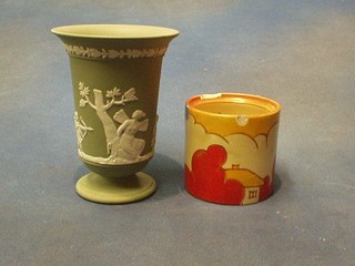 A Wedgwood green Jasperware vase the base marked '76, 5 1/2" and a Clarice Cliff Fantasque pattern preserve jar (no lid, some chips) 3"