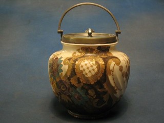 A Victorian porcelain biscuit barrel with silver plated mounts