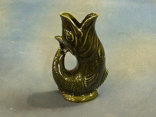 An Invento pottery gurgling fish jug 9" (chip to base)