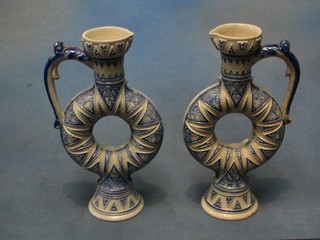 A pair of 19th Century German salt glazed moon flasks 8 1/2" (1 slight chip top rim)