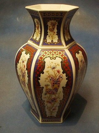 An Italian poly-octagonal porcelain vase with panelled decoration 16"