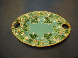 A Victorian oval Majolica twin handled dish with strawberry decoration 15" (f and r)
