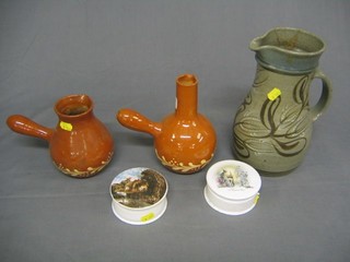 3 Continental pottery jugs with side handles and  2 circular pot lids and bases