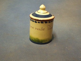 A Devonware pottery preserve jar and cover marked Home Made preserves 5"