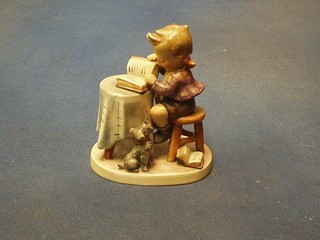 A Hummel figure, Little Book Keeper, base marked 1955 (head f and r)