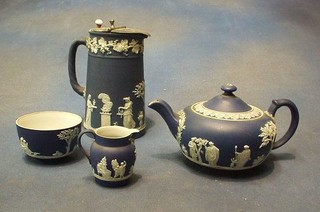 A Wedgwood green Jasperware teapot, the base marked Wedgwood England, 4", a Wedgwood blue Jasperware cream jug with plated mount, the base marked 24, 6", a Wedgwood sugar bowl and cream jug 2",