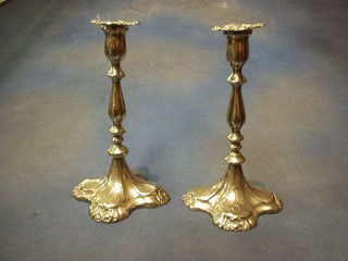 A pair of 19th Century engraved silver plated candlesticks with grape decoration 10"