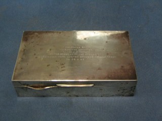 A plain silver cigarette case with hinged lid, Birmingham 1948, the lid inscribed, 6 1/2"