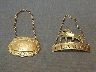 A "silver" decanter label "Claret" decorated a horse and a modern silver "Sherry" decanter label