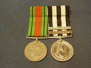 A pair Defence medal and Service medal of the Venerable Order of St John of Jerusalem with 2 bars