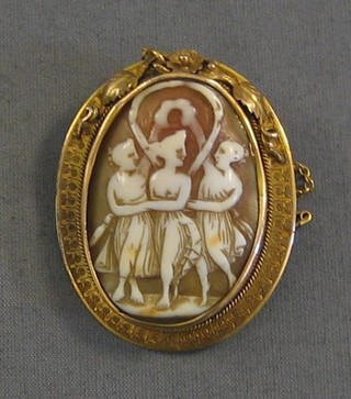 A 19th Century shell carved cameo brooch of three graces, in a gold plated mount