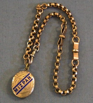 A gilt metal and enamelled locket marked Mizpah, hung a gilt metal chain