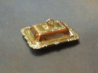 A silver plated butter dish in the form of an entree dish and cover 5"