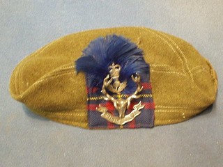 A Balmoral bonnet with Seaforth Highlanders cap badge