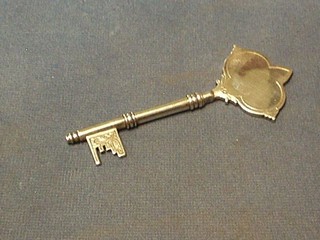 A plain silver presentation key, Sheffield 1958, 4"