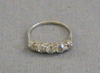 A lady's 18ct white gold engagement/dress ring set 5 diamonds