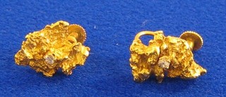A pair of Continental gold nugget earrings set diamonds