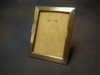 An  Argentinian silver easel photograph frame with engine turned decoration 8 1/2"