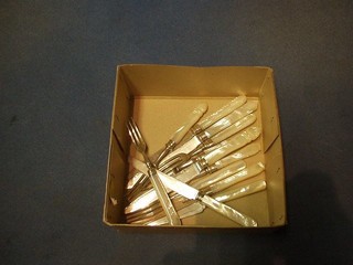 6 pairs of silver factory sample fruit knives and forks, with carved mother of pearl handles, by Mappin & Webb