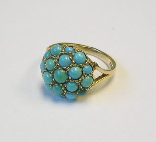 A lady's 9ct gold cluster ring set turquoise
