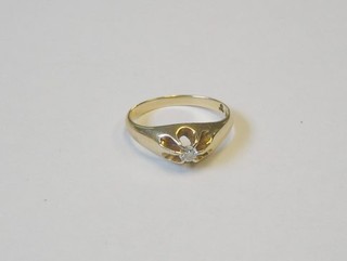 A 14ct gold gypsy ring set a diamond