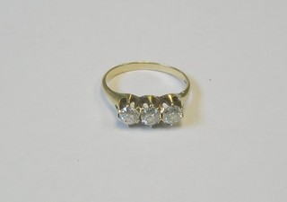 A lady's 14ct gold engagement/dress ring set 3 large old cut diamonds