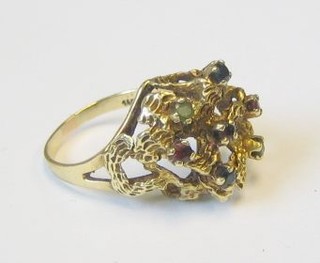 An Eastern high carat gold dress ring set semi-precious stones