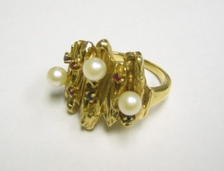 A Continental gold dress ring set 3 pearls and precious stones