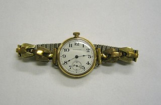 A lady's Waltham wristwatch contained in a rolled gold case