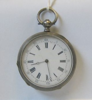 A Continental  open faced pocket watch contained in a silver case