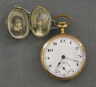 A gold plated pocket watch and a silver plated locket