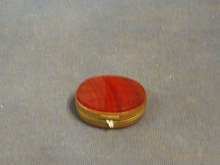 A 19th Century oval agate and gilt metal pill box with hinged lid 2 1/2"