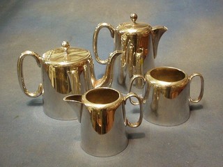 A 4 piece silver plated hotelware tea service with teapot, hotwater jug, twin handled sugar bowl and cream jug