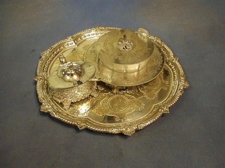 A circular engraved silver plated salver on bun feet by James Dixon 13", a circular cut glass butter dish contained in silver plated mounts (f) and a large silver plated mustard pot