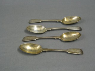 A set of Victorian silver fiddle pattern pudding spoons, London 1894