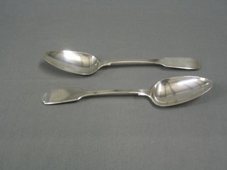 A pair of William IV silver fiddle pattern table spoons, London 1836