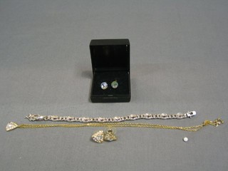 A silver bracelet set "amethysts", a pair of cut glass earrings etc