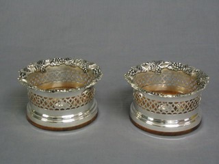 2 modern circular pierced silver plated wine coasters 6"