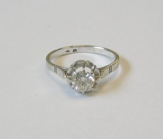 A lady's "white gold" dress ring set a diamond