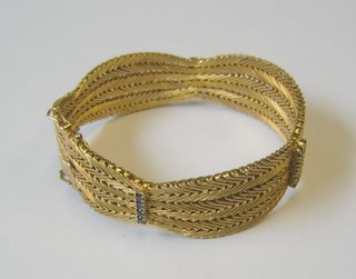 A lady's 18ct gold bracelet set sapphires