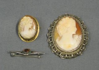 2 shell carved cameo portrait brooches and a silver brooch set a hardstone