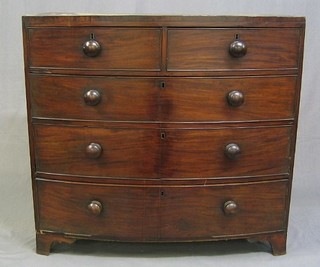 A 19th Century mahogany bow front chest of 2 short and 3 long drawers with tore handles, raised on bracket feet 42"